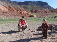 18-Mommy_and_Kenny-green_desert_with_Fortification_Hill_in_background