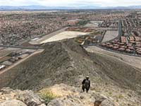 34-beyond_the_peak,heading_down_ridgeline_to_south,Joel_leading