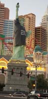 08-Statue_of_Liberty_even_wears_a_mask,wears_Las_Vegas_Raider_jersey