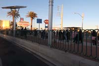 065-Las_Vegas_Sign_is_quite_popular-tourists_lined_up_for_photo_with_sign