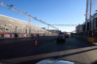 138-racetrack-approaching_Koval_with_grandstands_before_F1_paddock