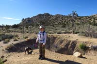 06-Kenny_at_a_fenced_off_prospect_mine_off_the_trail