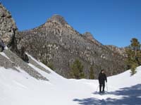 29-Chris_Ransel_on_the_trail_with_Sisters_in_the_background