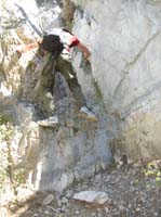 74-Dad_downclimbing_class_III_cliff