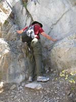 76-Dad_downclimbing_class_III_cliff