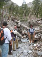 10-Mike_Nasrin_Evan_and_Joel_taking_a_break_amongst_debris