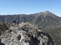 11-Mark_and_Monica_approach_South_Sister_with_Mt_Charleston_in_background