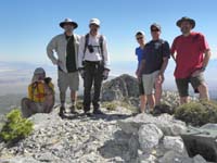 16-group_on_South_Sister_with_North_Sister_in_background-Harlan,me,Ed,Monica,Mark,Jeff