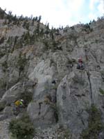10-scrambling_up_the_cliff_to_the_left_of_Big_Falls