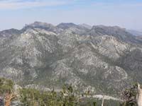 19-scenic_view-South_and_North_Sister_in_foreground,McFarland,Bonanza,Wheeler,and_Mack's_Peak_behind_them