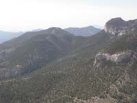 32-Fletcher_Peak_and_Mummy's_Toe-mostly_burned_Harris_Peak_between_them_in_distance