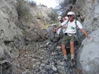 44-heading_down_the_only_gully_offering_a_break_through_the_cliff_band