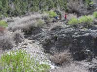 13-kids_find_a_bit_of_snow_and_Big_Falls_in_distance