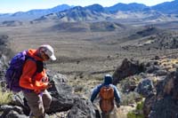 28-heading_down_from_saddle-Ed's_Xterra_before_and_to_right_of_hump_in_center