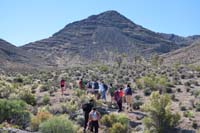 04-group_heading_towards_the_drainage_to_L,then_slope_to_R_towards_peak