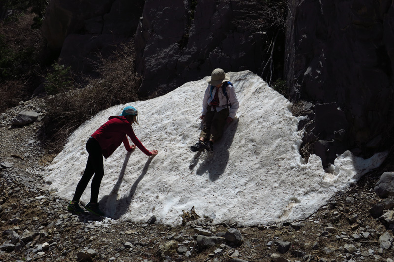 25-playing_and_sliding_down_a_patch_of_snow