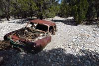 57-Blue_Tree_car_covered_by_a_couple_feet_of_debris