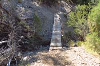 22-flood_damage_area,but_fixed_by_mountain_bikers_and_extended_the_bridge