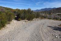 25-trail_splits_to_the_left,not_down_dirt_road_to_right