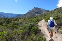 22-Laszlo_hiking_with_scenic_view_along_Shady_Hollow_Trail_looking_W-about_one-third_mile_from_parking_lot