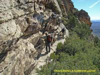 03-Chris_and_Greg_traversing_a_narrow_ledge