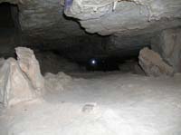 08-caver_crawling_through_low_tunnel