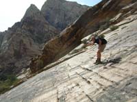 006-Jim_tossing_rocks_down_the_slab