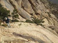 14-Doug_and_Joel_making_their_way_up_steeper_sandstone