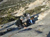 03-Fred_Lee_and_Sue_making_their_way_along_the_rocks