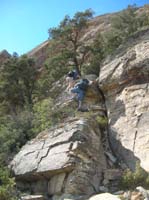28-Jen_and_Eric_climbing_some_rock