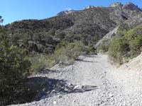 09-took_a_walk_to_1.75_mile_point_up_road_to_view_another_washed_out_area-old_washout_narrowing_road