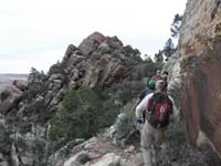 06-group_hiking_a_shelf-Baby_Wilson_to_left-accessed_by_drainage_below,but_we_didn't_visit