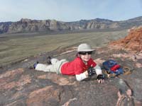 18-Kenny_enjoys_the_views_with_Calico_Hills_parking_lot_and_peaks_beyond