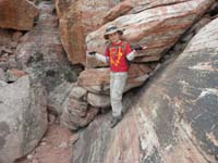 29-Kenny_shows_off_he_can_stand_on_a_steep_sandstone_slope_without_slipping