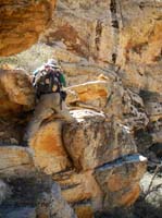 46-me_stretching_to_make_the_move_across_the_rock-from_Luba