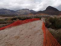 20-looking_up_river_toward_new_bridge_to_avoid_flood_wash-not_open_yet