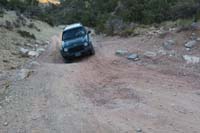 02-deep_ruts_in_road_after_PJ_turnaround_and_spring_crossing-Joel_having_trouble