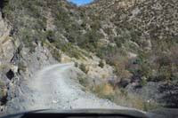 83-heading_down_dirt_road-narrow_section