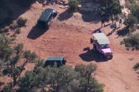 32-view_from_peak_zoomed_to_our_vehicle_below_and_Jeff_Markee_on_tour_with_guests