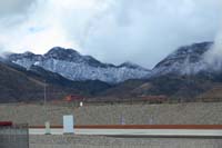 04-Little_Red_Rock_with_snowy_peaks_beyond