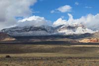 14-zoom_of_snowy_peaks_and_low_clouds