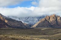 15-zoom_of_snowy_peaks_and_low_clouds