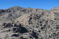 10-Kenny_leading_the_way_along_the_ridgeline_to_peak-Lonely_Pinion_Mountain_in_distance