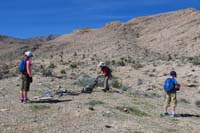 23-kids_playing_with_trash_left_in_the_desert-Kenny_tries_to_vacuum_up_the_mess-Daddy_carried_a_bit_out