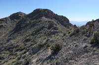 07-peak_ahead,L_of_cliff,then_up-limestone_arch_in_the_distance