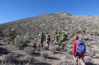 03-Laszlo,Ed,Luba_heading_up_the_slope_to_later_named_Corner_Peak