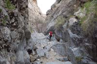 70-Ted_continuing_down_canyon_to_the_next_rappel