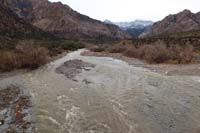 13-normally_dry_wash_is_now_a_river-looking_upstream