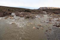 14-normally_dry_wash_is_now_a_river-looking_upstream