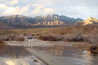 29-another_truck_ready_to_drive_across_flood_with_glowing_sunset_views